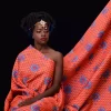Afrikan Star Royals pattern on Sparkle fabric modeled by Akello Odundo © 2024 Nanjala Design for UndaMeta