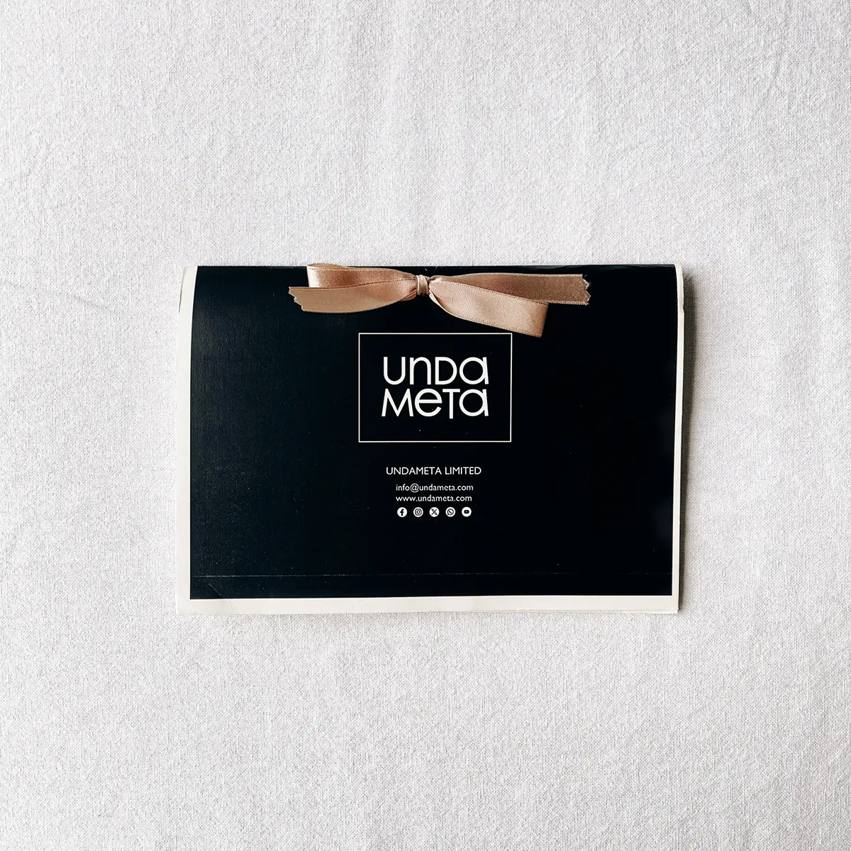 UndaMeta Fabric Swatch Catalogue front cover in black