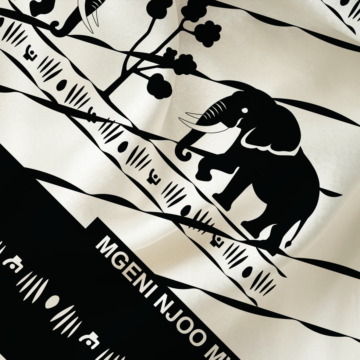 Pattern design "Mgeni Njoo Monochrome" zoom in shot on fabric mockup