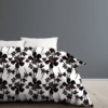 Black Petals duvet cover by © 2025 Nanjala Design for UndaMeta